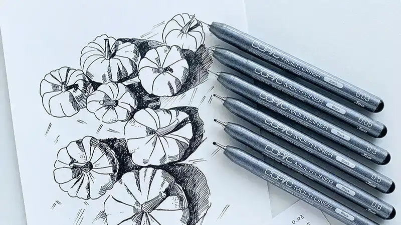 Fineliner pens for drawing and outlining.