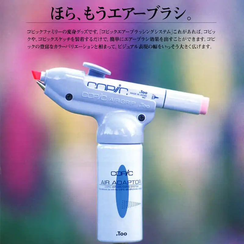 A light blue airbrush system with a marker attached.