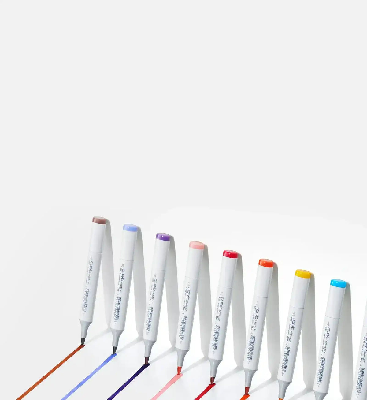 A set of colorful art markers, each drawing a line of its respective color.