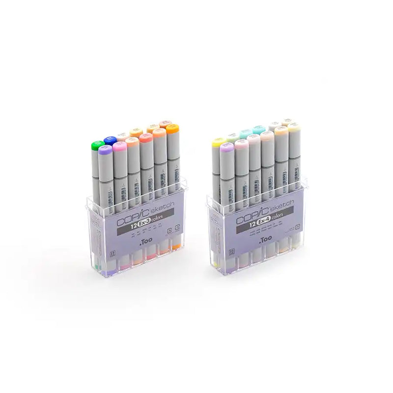 Two sets of 12 Copic Sketch markers in clear cases.